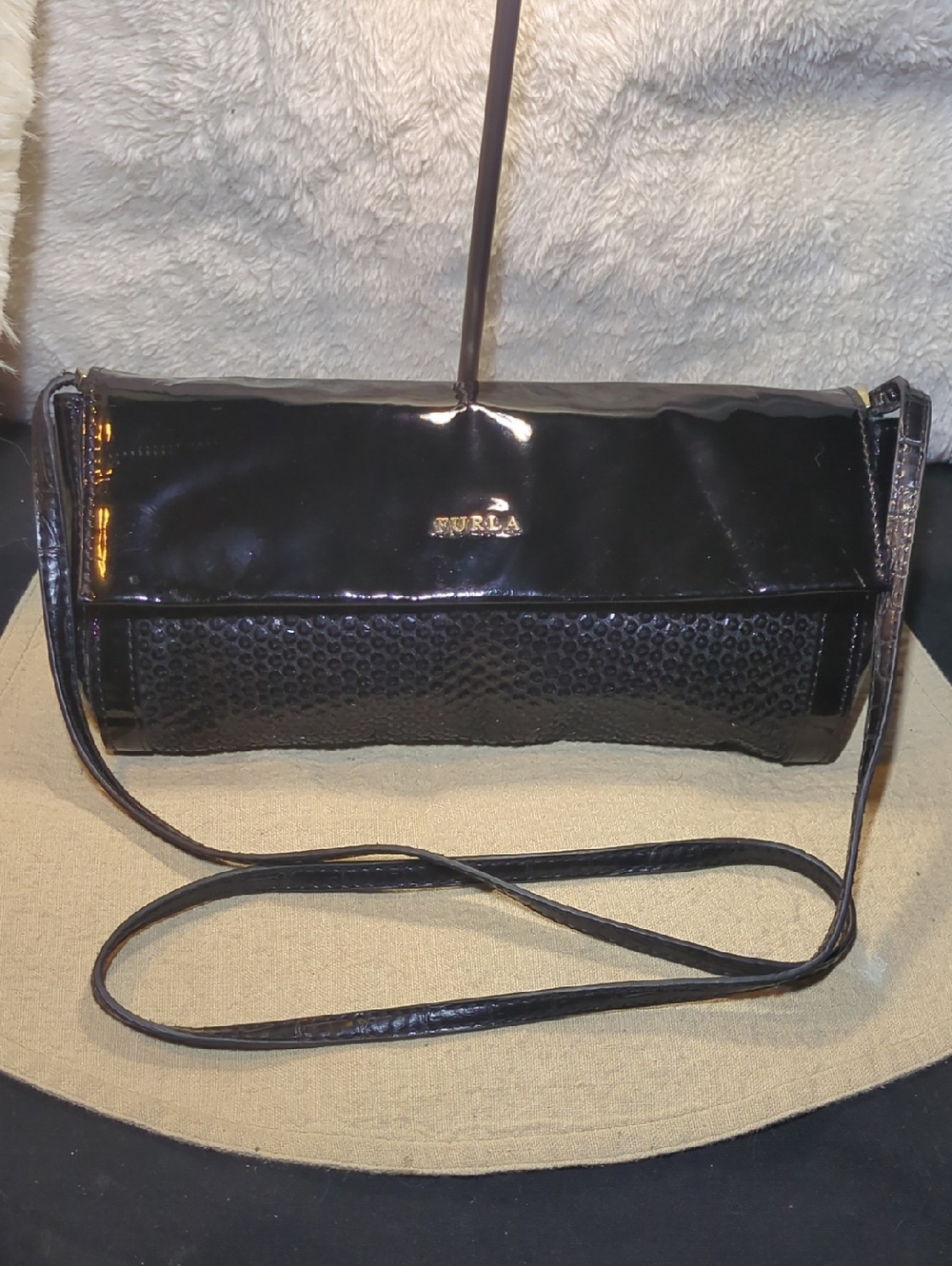 Furla Black Patent Leather Clutch with Textured Panel $210